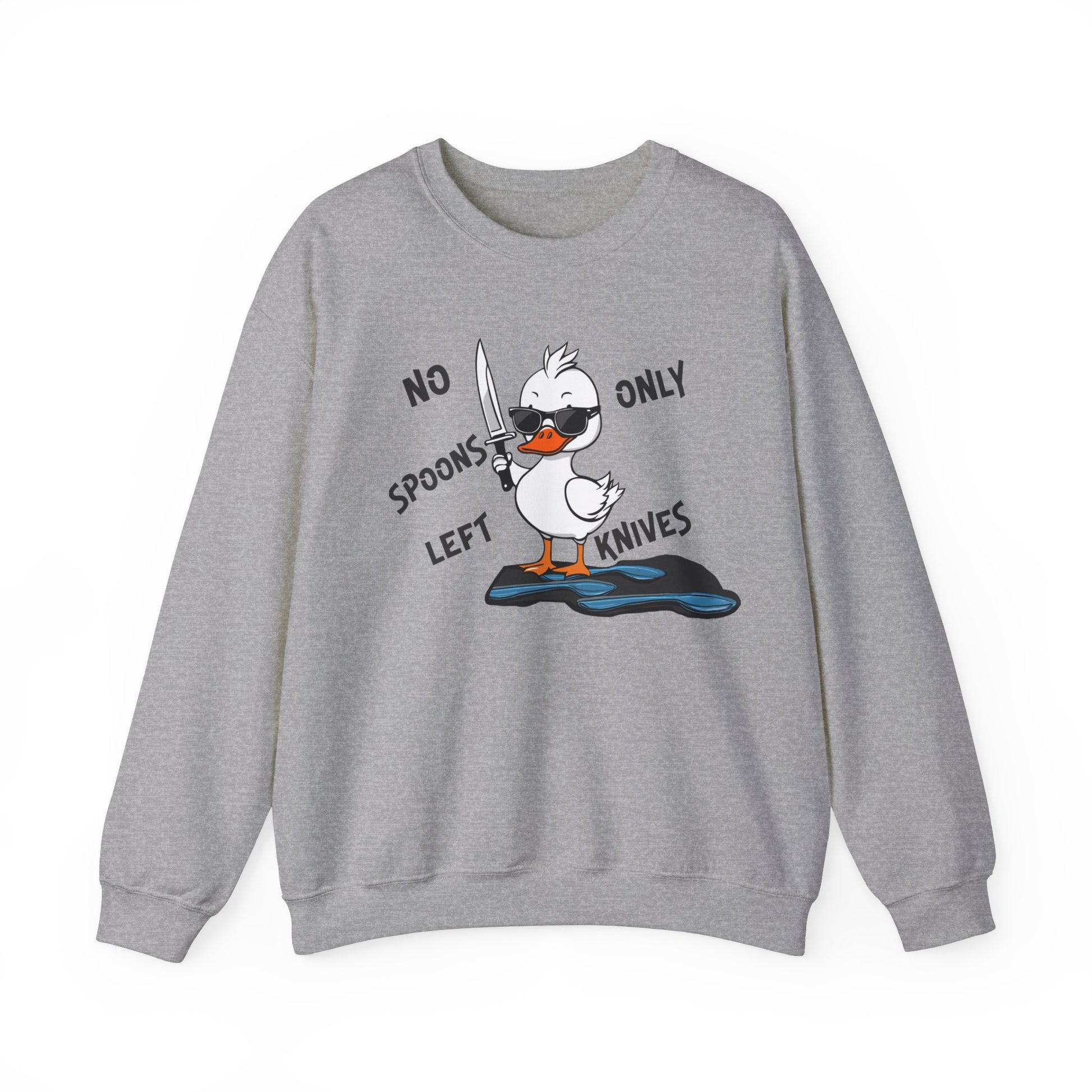 This image shows a sport grey crewneck sweatshirt with a cartoon design of a duck holding a knife, standing in a puddle of spoons. The text around the duck reads “NO SPOONS LEFT, ONLY KNIVES.” The sweatshirt is displayed flat against a plain white background, clearly showcasing the humorous design and text.