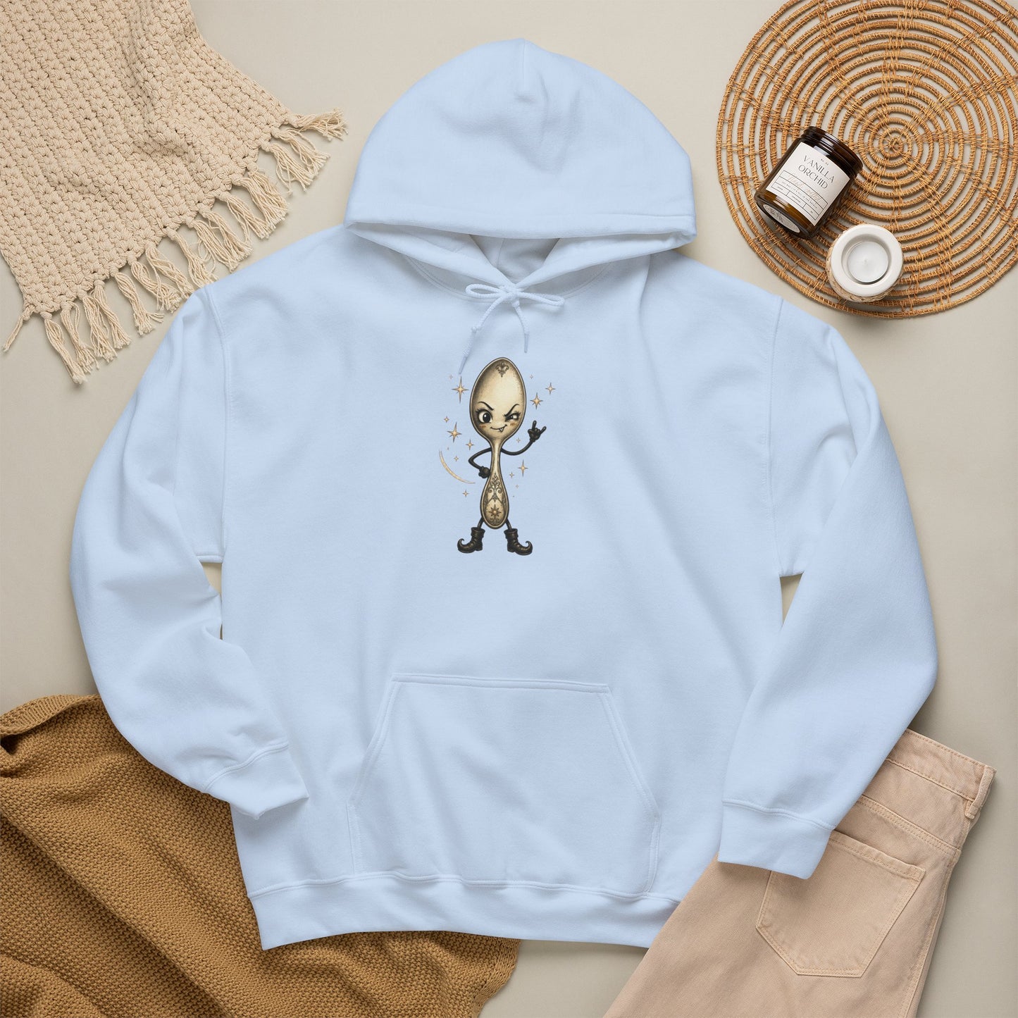A light blue pullover hoodie laid flat with a central graphic of a cartoon spoon in true rock spirit hand. 