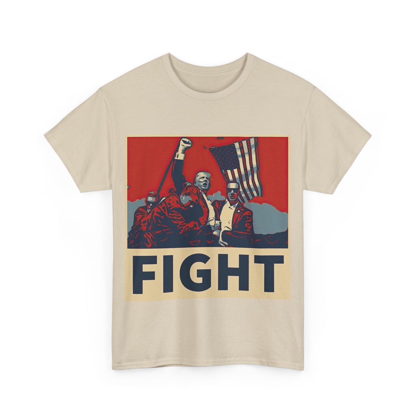 This image shows a sand colored unisex heavy cotton t-shirt with a graphic design on the front. The design features a stylized, poster-like illustration of former President Donald Trump, raising his fist and standing in front of an American flag. The word “FIGHT” is prominently displayed at the bottom of the illustration in bold capital letters. The graphic uses a color palette reminiscent of red, white, and blue, contributing to a patriotic theme. The t-shirt is displayed on a plain white background.