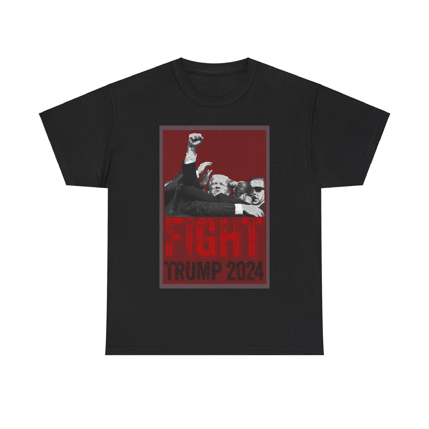 This image displays a black, unisex, heavy cotton t-shirt with a graphic design on the front. The design features a black-and-white photograph of former President Donald Trump raising his fist, surrounded by his Secret Service, set against a red background. Below the photograph, the words “FIGHT” and “TRUMP 2024” are printed in bold letters, with “FIGHT” in a distressed red font and “TRUMP 2024” in black. The t-shirt is laid out on a plain white background, prominently showcasing the design.