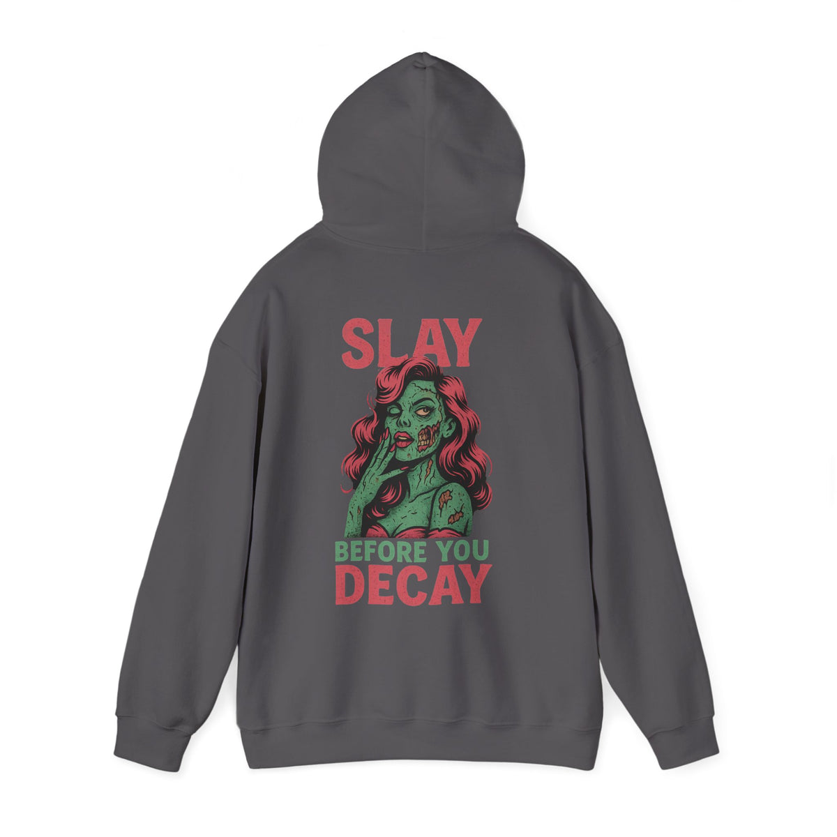 Charcoal hoodie shown from the back with the hood up, laid flat on white, showing a back print of a green zombie pin-up with long red hair, one eye winking, reading ‘SLAY BEFORE YOU DECAY’.