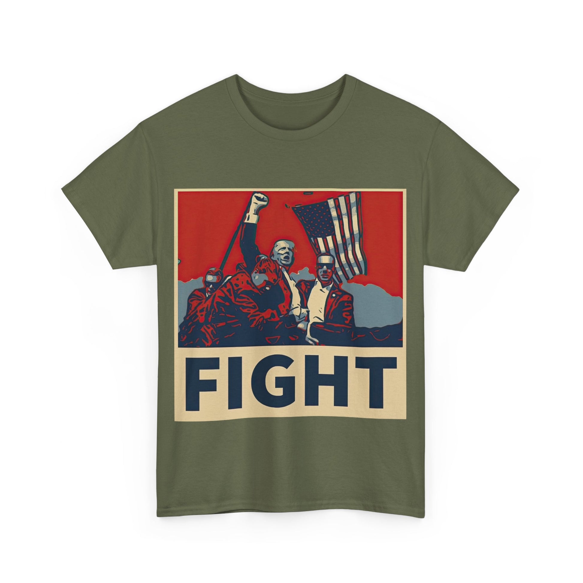 This image shows a military green, unisex, heavy cotton t-shirt with a graphic design on the front. The design features a stylized, poster-like illustration of former President Donald Trump raising his fist and standing in front of an American flag. The word “FIGHT” is prominently displayed at the bottom of the illustration in bold capital letters. The graphic uses a color palette reminiscent of red, white, and blue, contributing to a patriotic theme. The t-shirt is displayed on a plain white background.