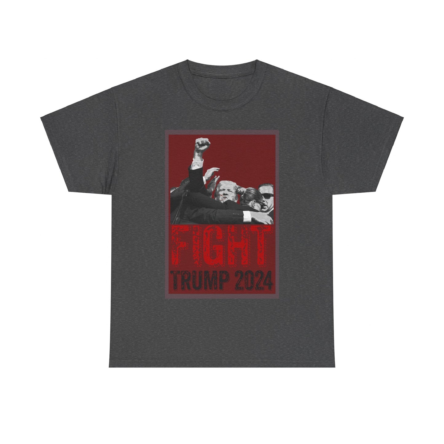 This image displays a dark, heather-colored, unisex, heavy cotton t-shirt with a graphic design on the front. The design features a black-and-white photograph of former President Donald Trump raising his fist, surrounded by his Secret Service, set against a red background. Below the photograph, the words “FIGHT” and “TRUMP 2024” are printed in bold letters, with “FIGHT” in a distressed red font and “TRUMP 2024” in black. The t-shirt is laid out on a plain white background, prominently showcasing the design.