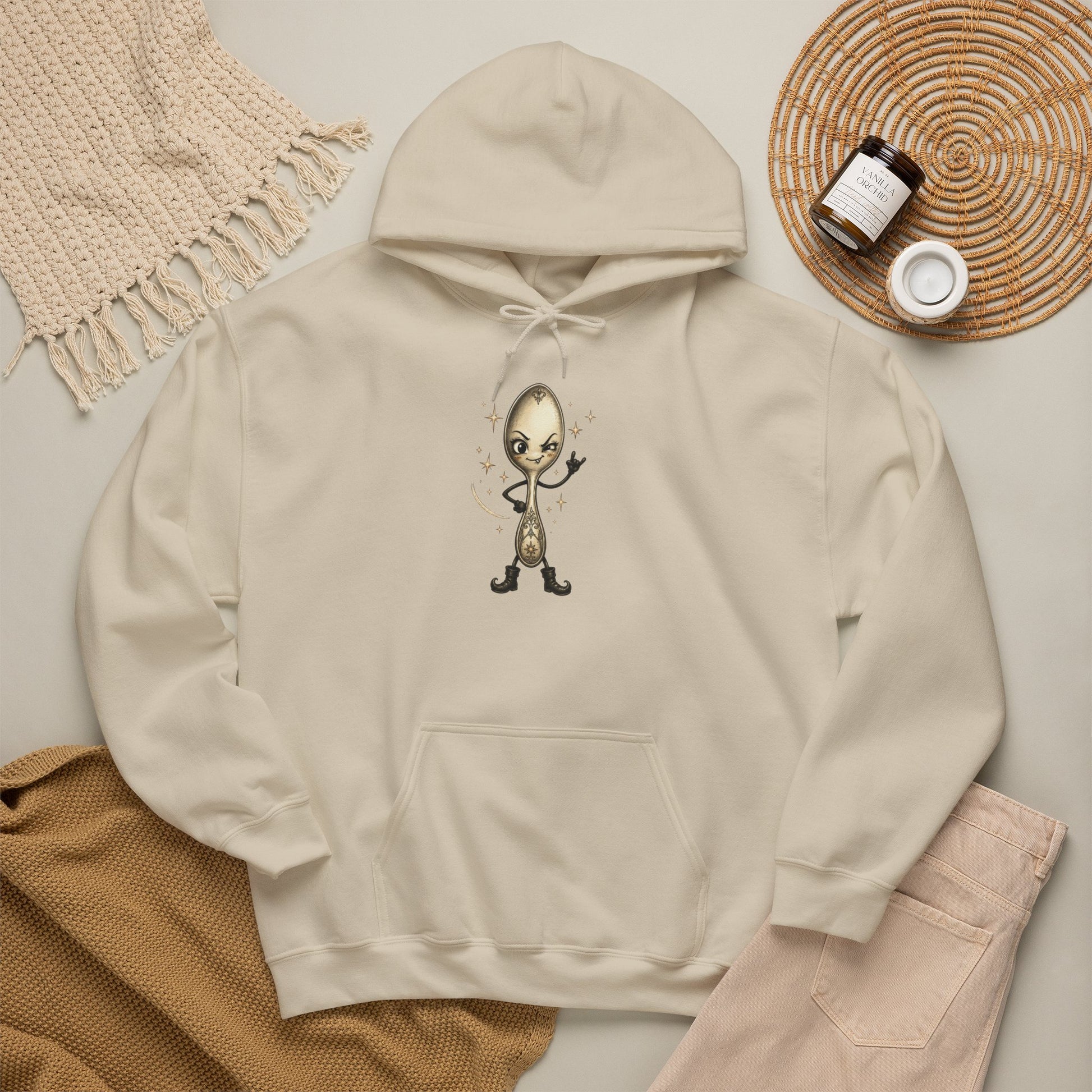 Sand colored pullover hoodie laid flat, featuring a whimsical vintage-style spoon character making a rock hand gesture, surrounded by small star accents.
