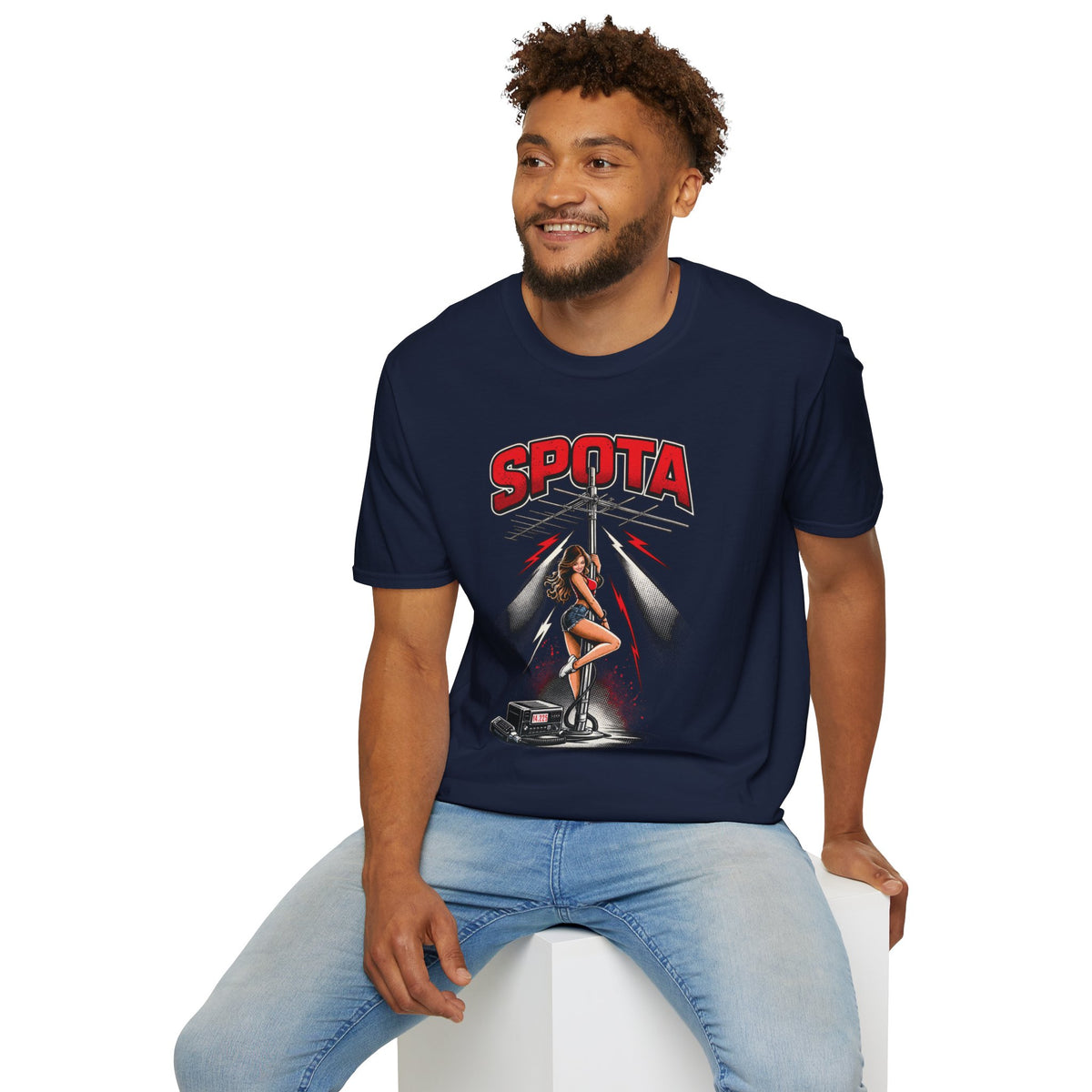 Navy blue T-shirt modeled with a retro ham radio design featuring “SPOTA,” a pin-up style woman, antenna tower, radio equipment, and red lightning accents.