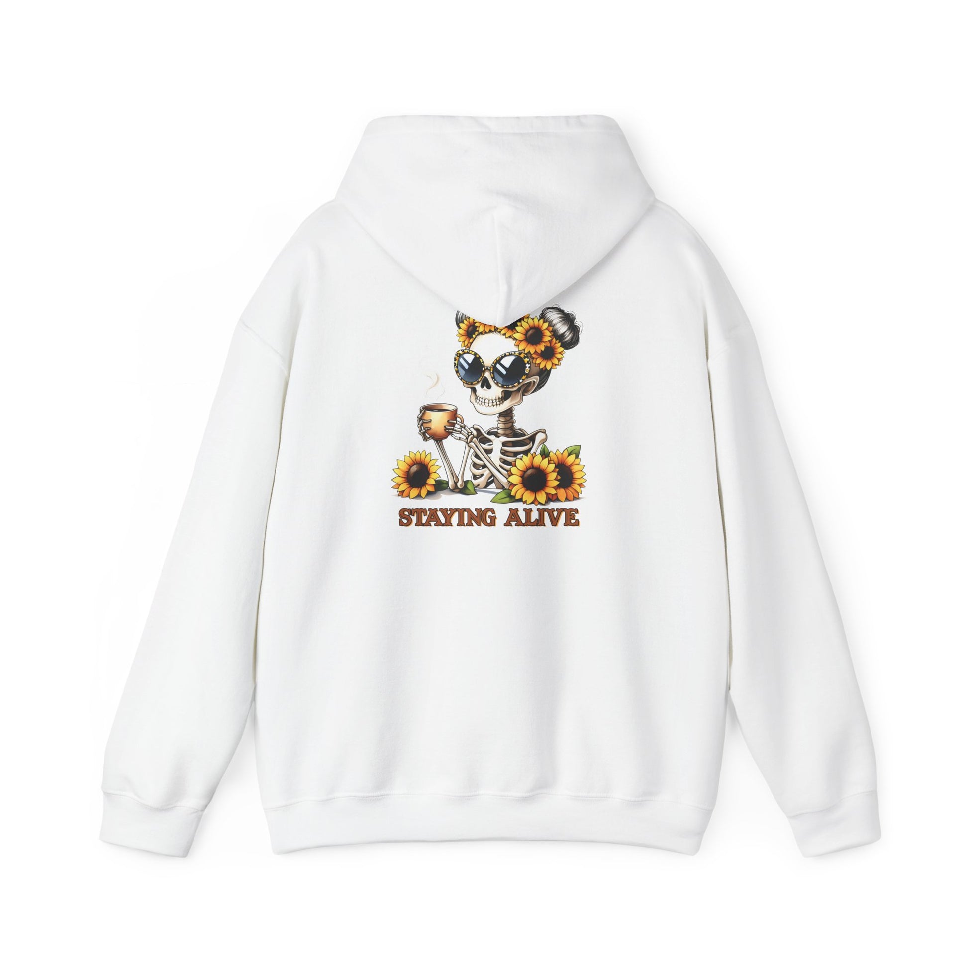 A White pullover hoodie shown from the back, featuring a skeleton wearing oversized sunglasses and sunflower space buns, holding a steaming mug, with “STAYING ALIVE” printed below.