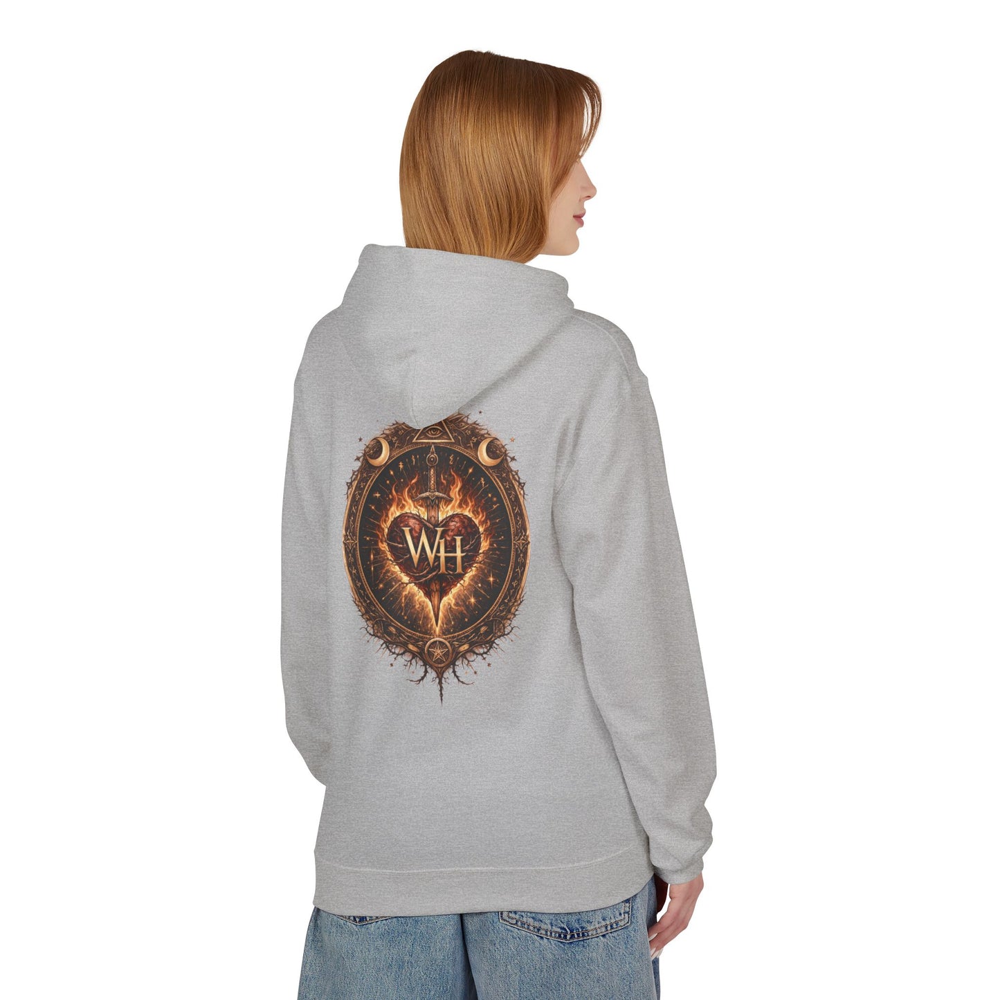 Model wearing a sport grey-colored pullover hoodie shown from the back, featuring the large circular “Wild Heart” mystical crest with a flaming heart, sword, crescent moons, stars, and “WH” monogram in warm brown and orange tones.