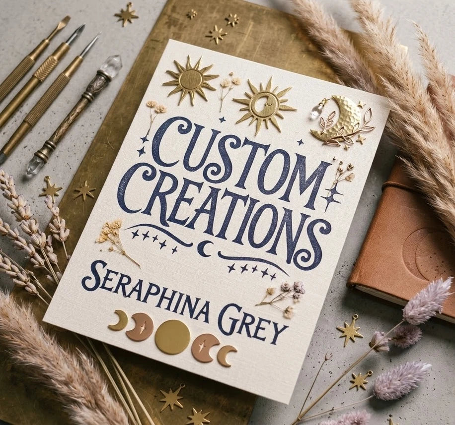 Custom Creations — Seraphina Grey, surrounded by gold celestial details, art tools and dried botanicals