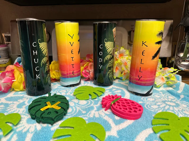 Four tropical tumblers personalized with names